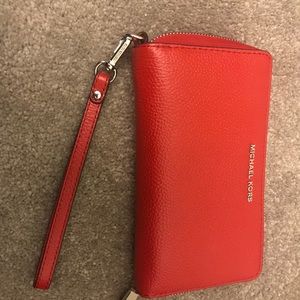 Brand new red Michael Kors wristlet -